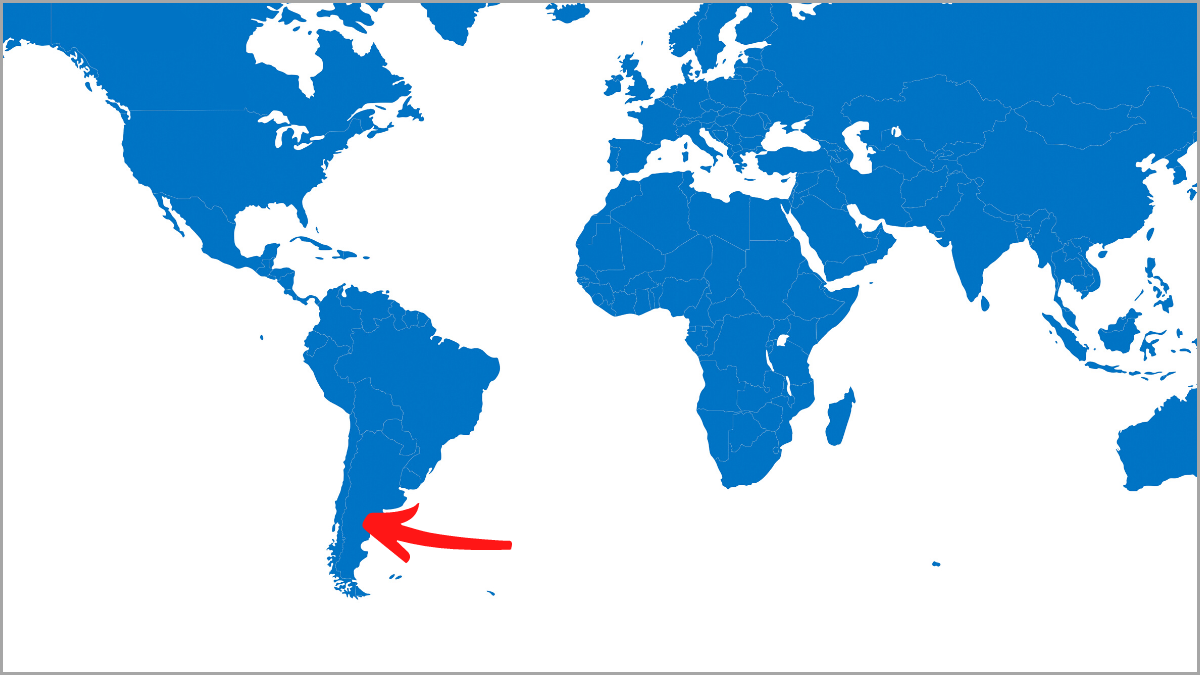 Weltkarte, auf der ein roter Pfeil Patagonien markiert (verweist auf: Schwere messen zwischen Atlantik und Anden)
